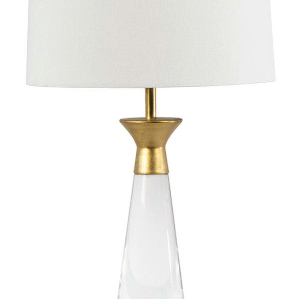 Crystal lamp with a gold finish and white shade